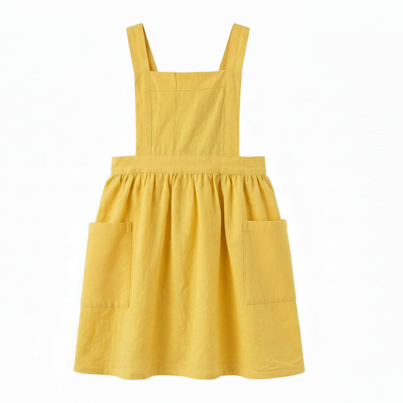Gult barnförkläde i bomull och linne med kjolform